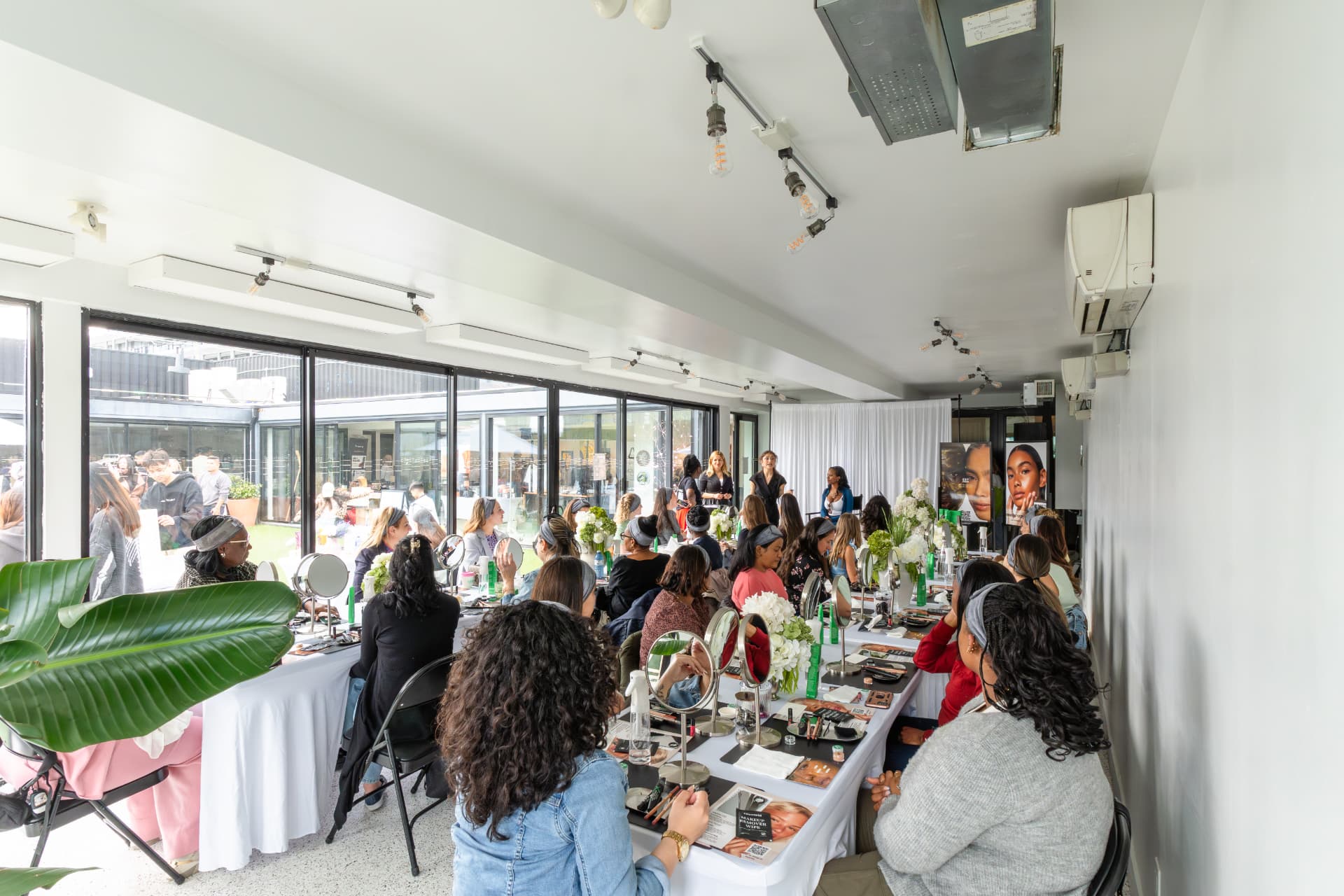 Guests participating in a beauty workshop